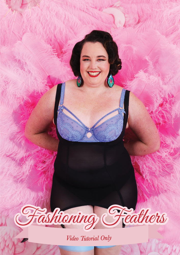 
            
                Load image into Gallery viewer, Fashioning Feathers: Video Tutorial Only. Lottie is posing in black and blue lingerie, holding pink fans behind her back. 
            
        